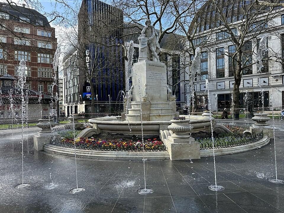 Leicester Square, a pedestrianised West End square ringed by cinemas, with a central garden